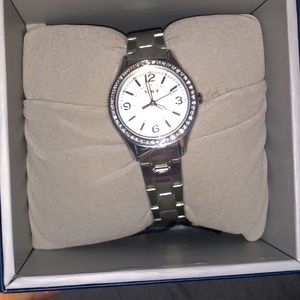 Women’s silver Timex watch.